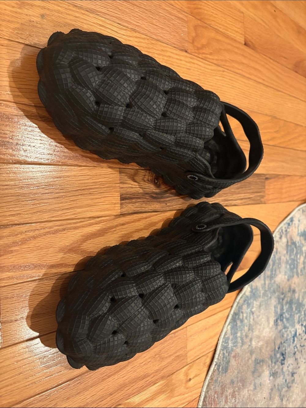 Air Underground Globe-Shaped Clogs in Black